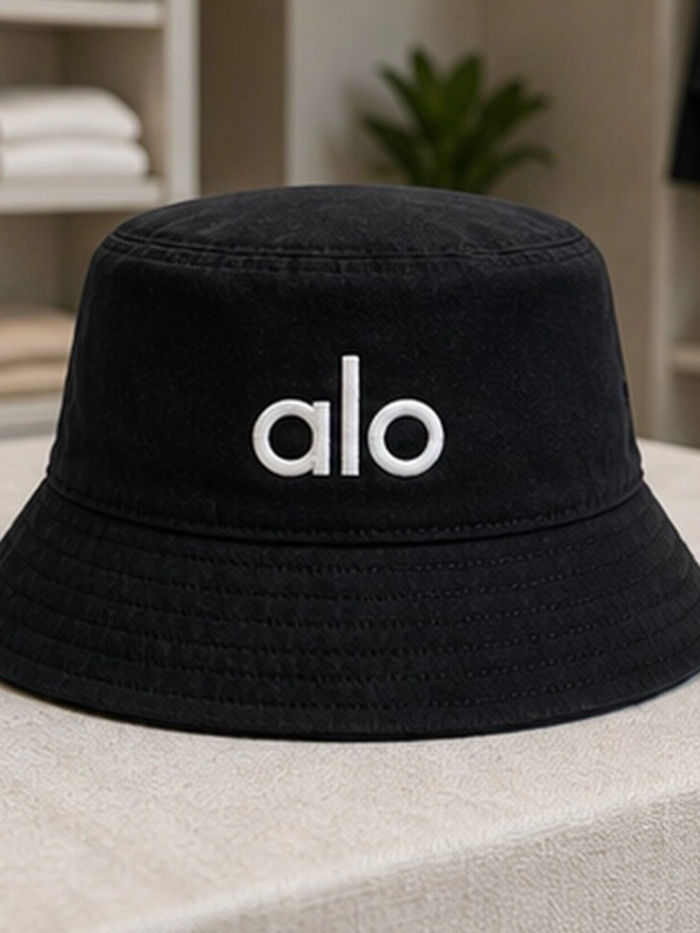 ALO Yoga Black Bucket Hat with White Logo